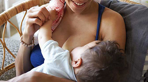 Mother breastfeeding her baby