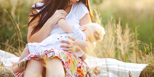 parent holding hands with child