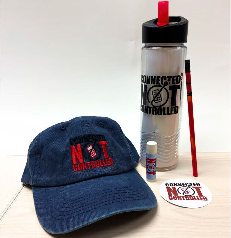 Photo of prizes including hat, water bottle, lip balm, pencil and sticker