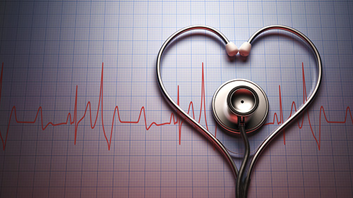 Photo of stethoscope over charts