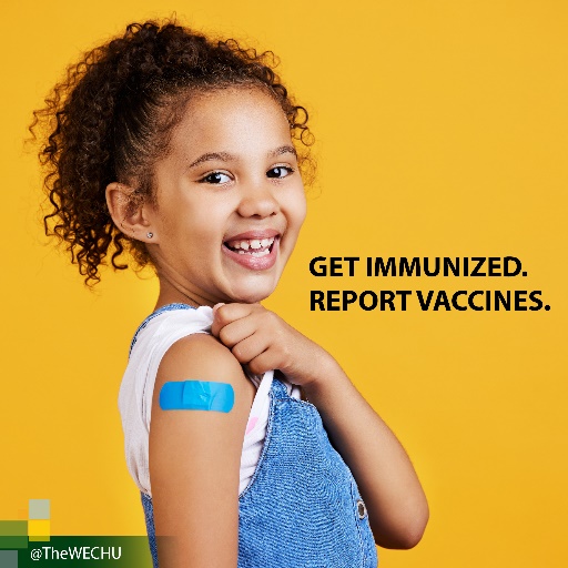 Photo of a child with a bandage on their arm and smiling