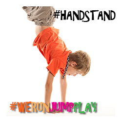 Physical literacy - photo of child doing handstand