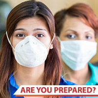 Photo of three people wearing respiratory masks